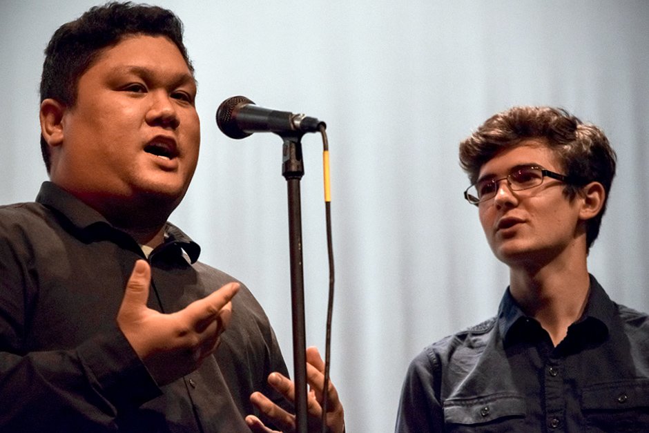 Student singing on stage