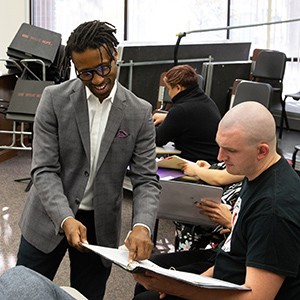 Omari teaching a music class