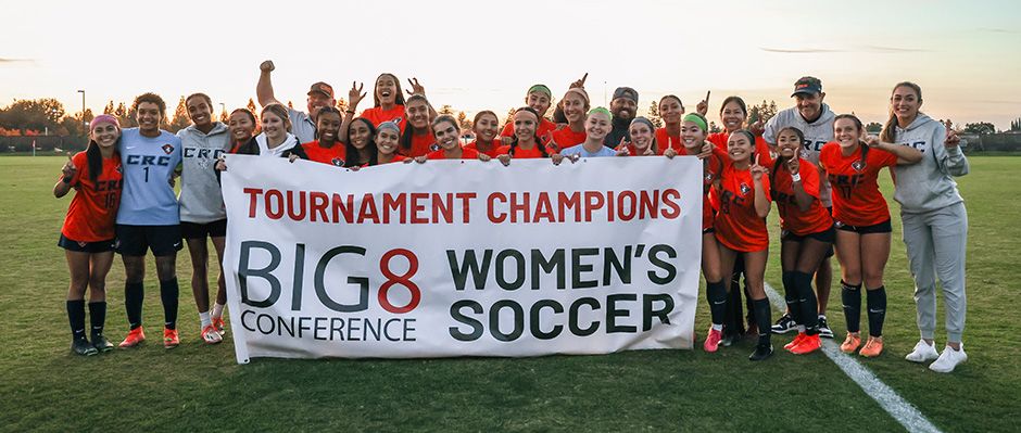 Team photo of CRC Women's Soccer holding a banner stating Tournament Champions, Big 8 Conference, Women's Soccer