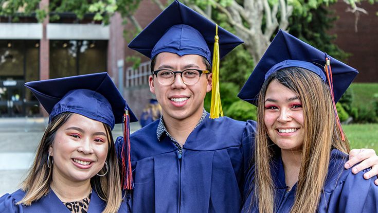 CRC graduates smiling together