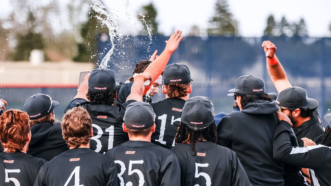 CRC baseball players congratulating each other