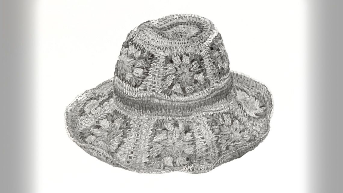 A black and white pencil drawing of a straw hat