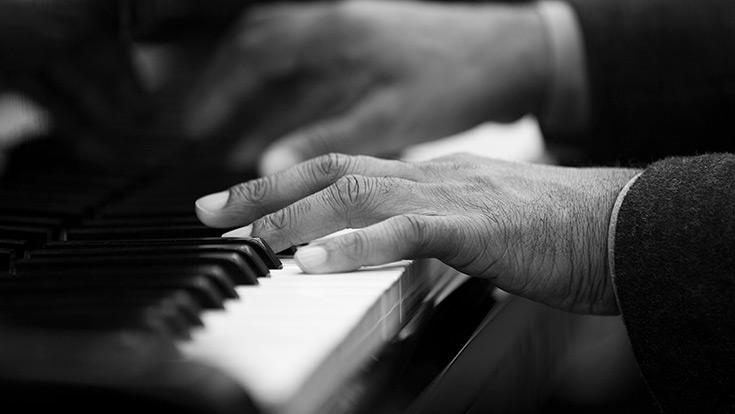 hands on piano keys
