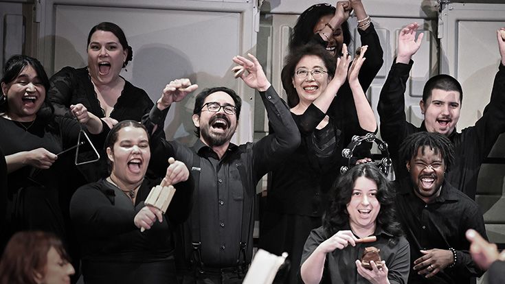 CRC Combined Choirs, singing with hands in the air