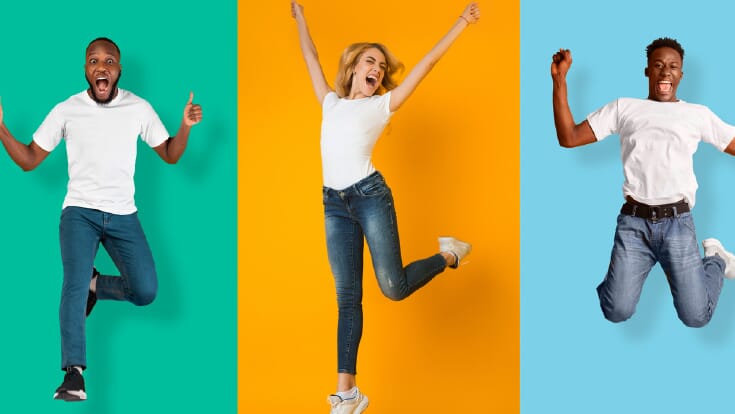 students smiling and jumping